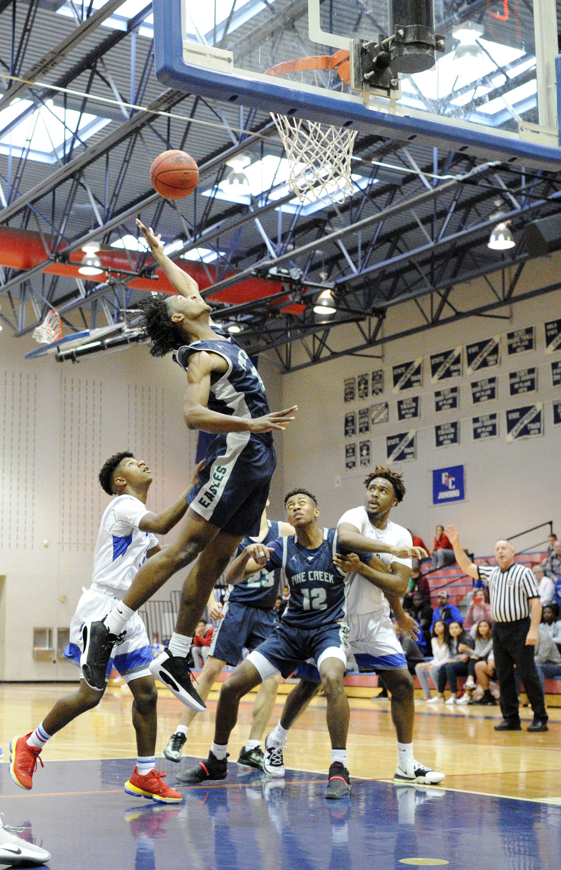 PHOTOS: Fountain-Fort Carson Trojans (58) Pine Creek Eagles (70)